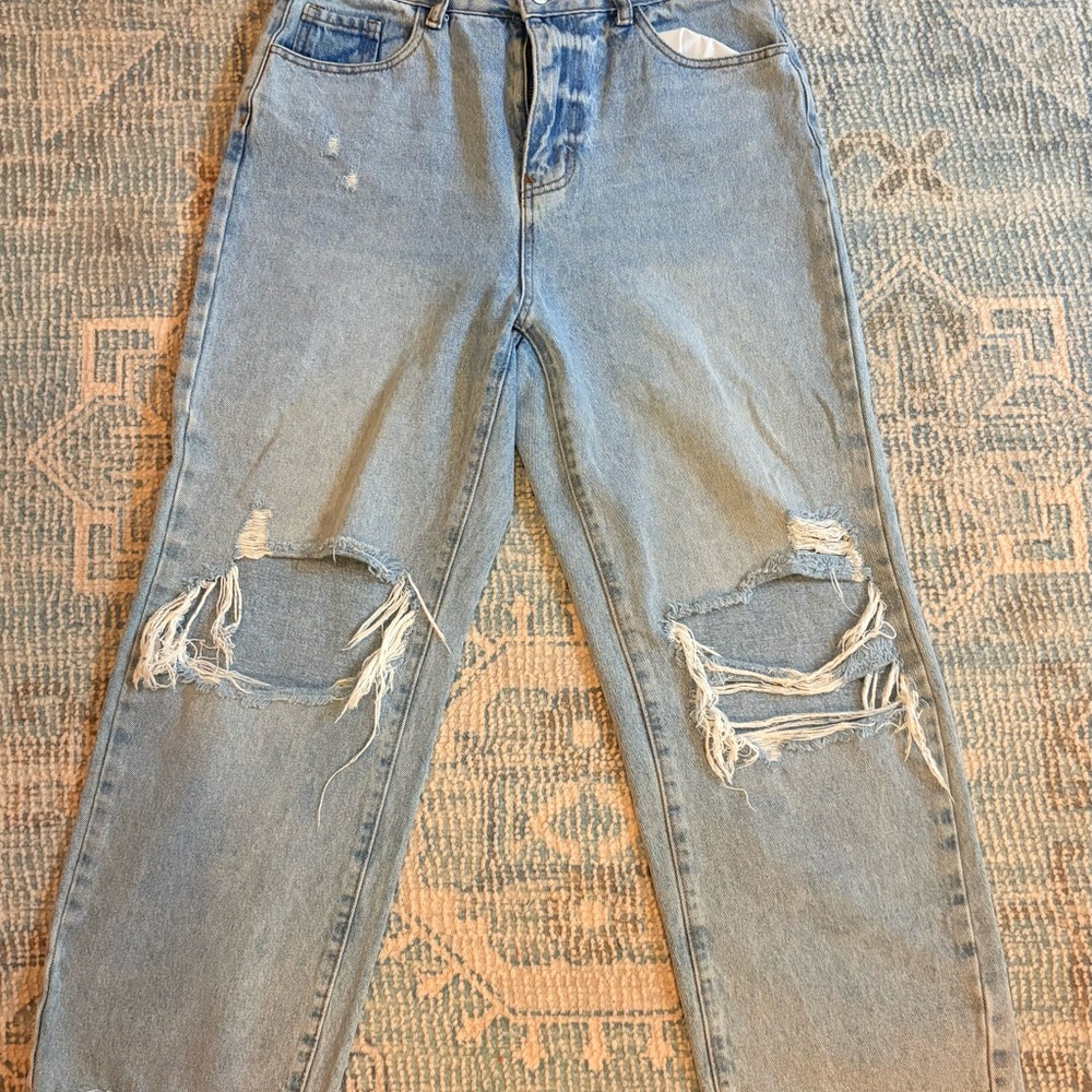 Distressed Light Blue Jeans